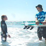Surf Papa mit surf Tochter